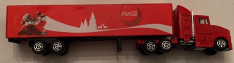 10340-1 € 5,00 coca cola vrachtwagen kersmtan en rendieren ca 18 cm.jpeg